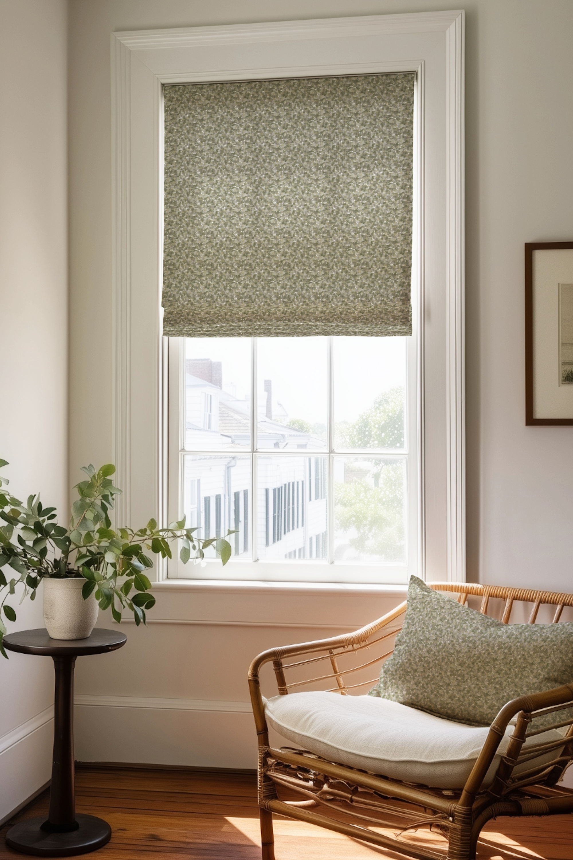 Corner of a bedroom in a Charleston home with a Roman shade and pillow in Tortoise fabric in Thyme by Emily Daws.