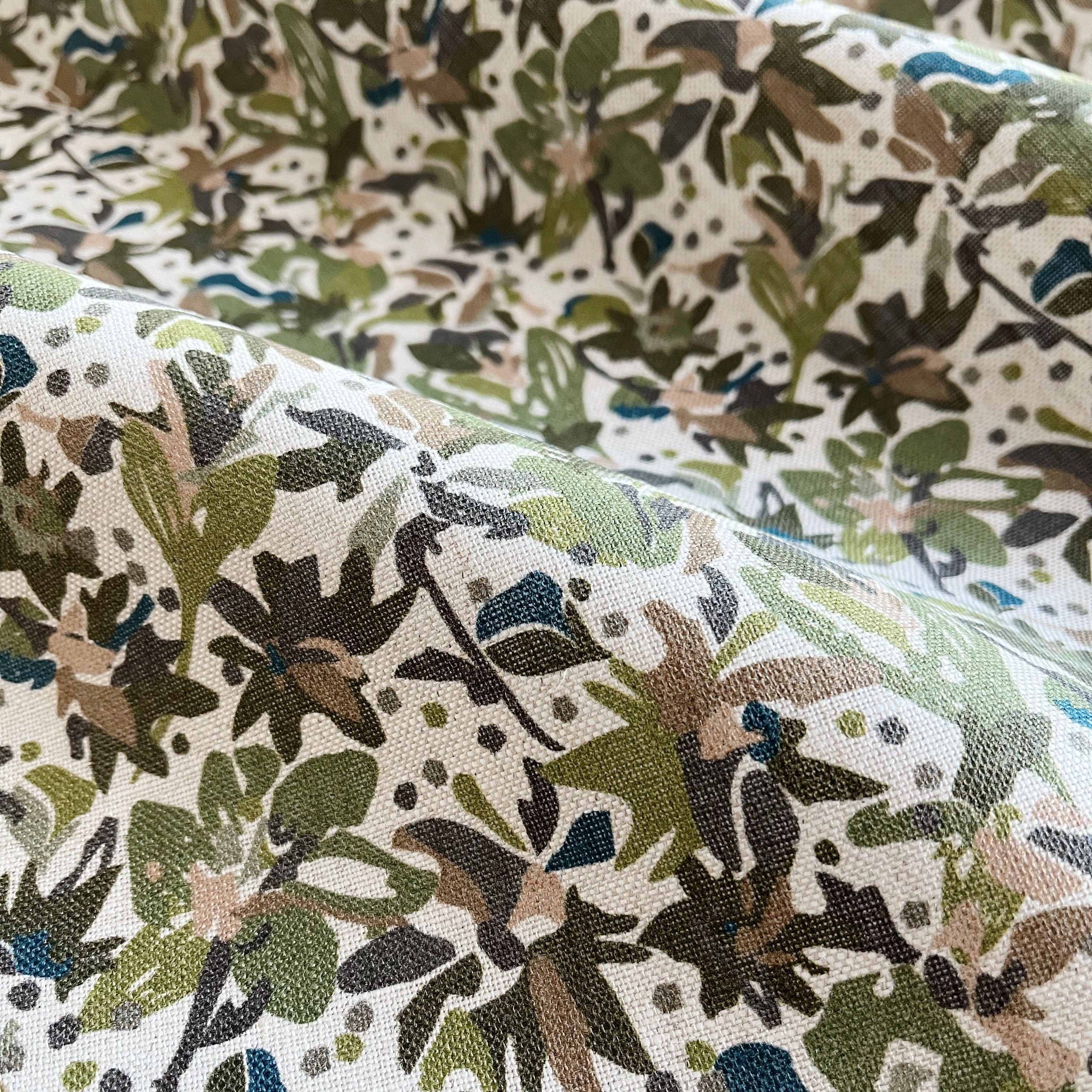 Eden fabric in Olive – close-up of linen texture and leafy pattern; perfect for pattern sofas