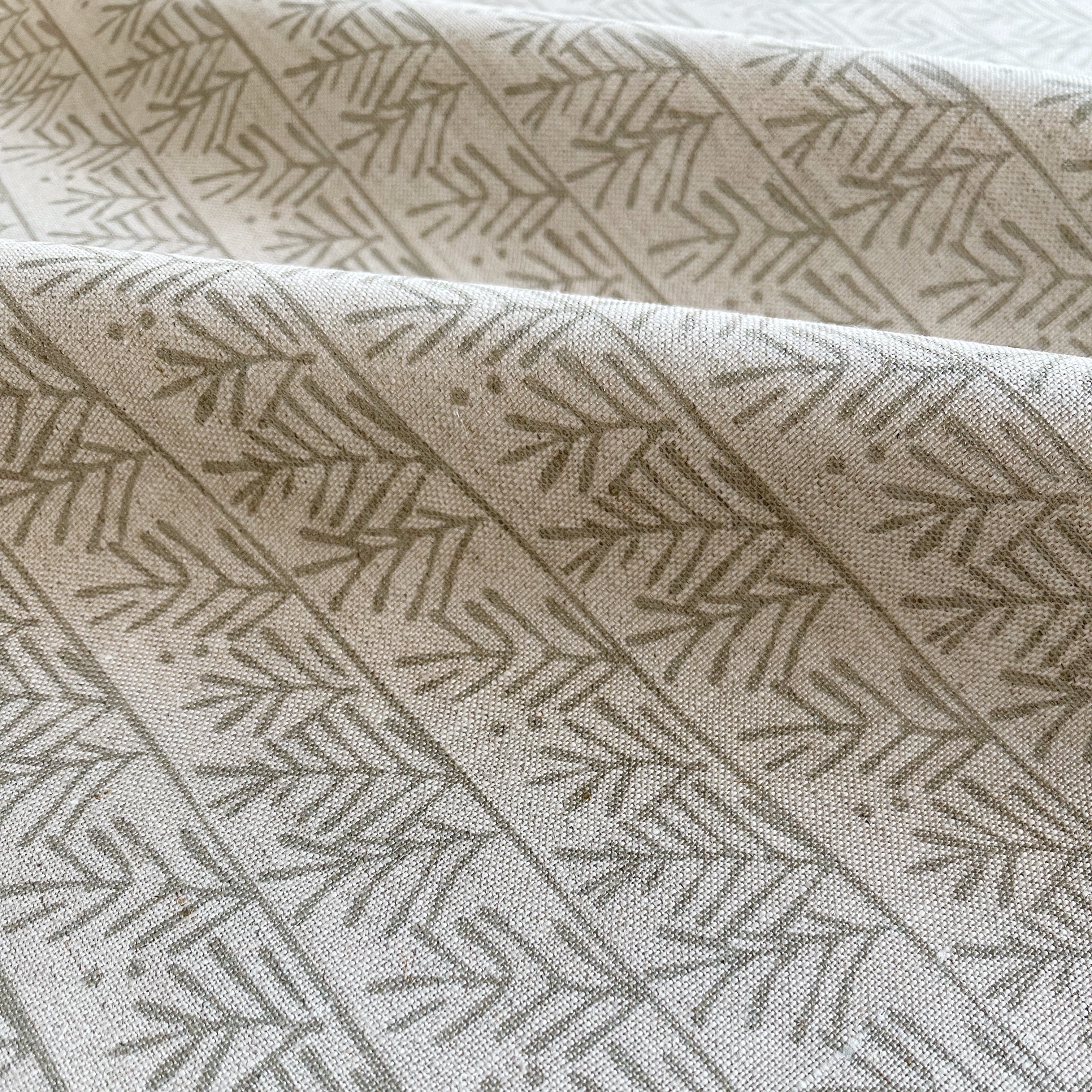 Hemlock fabric in Frost – close-up of linen texture and leafy pattern; perfect for pattern sofas