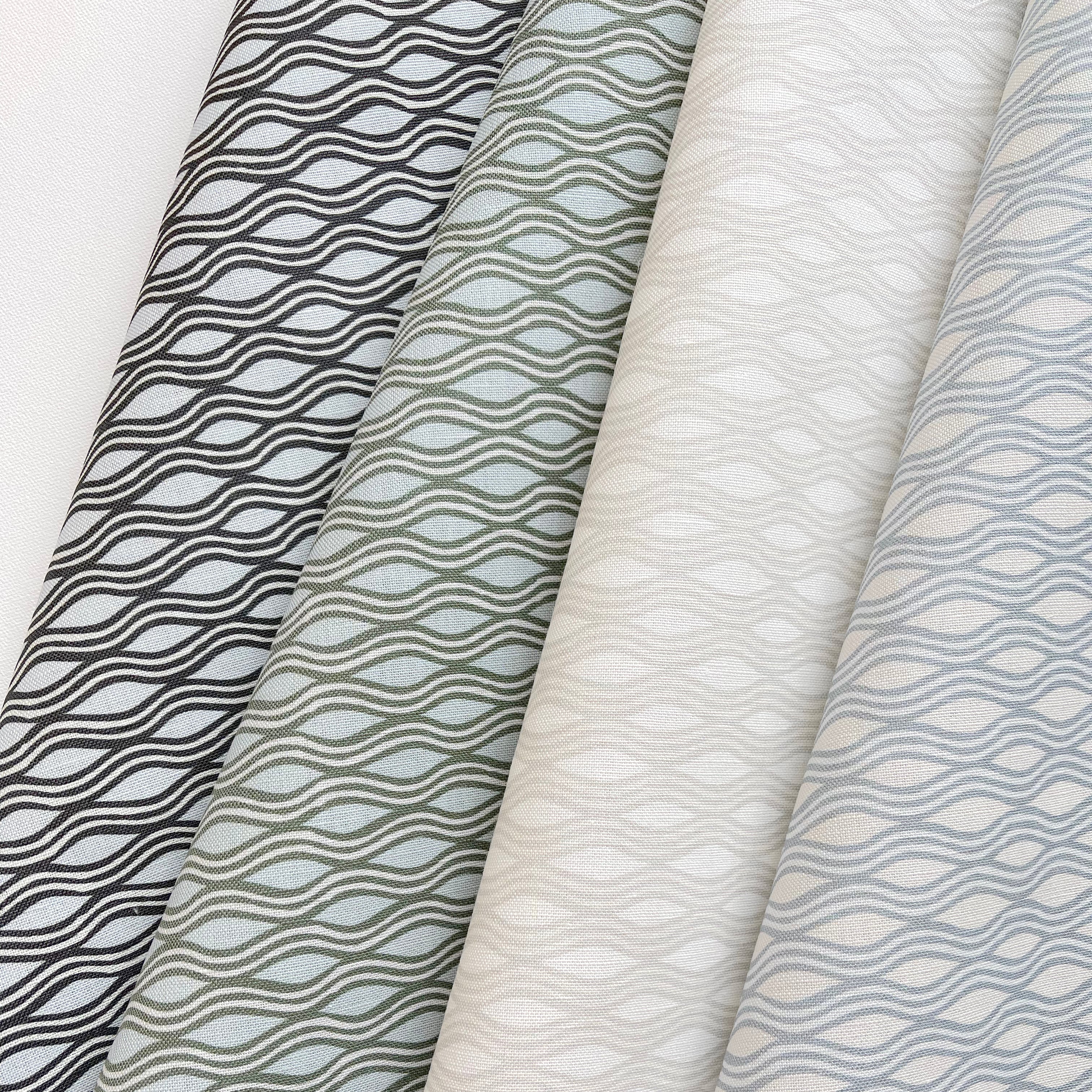 Inlet fabric in Beach by Emily Daws styled in an interior — Waterways Collection