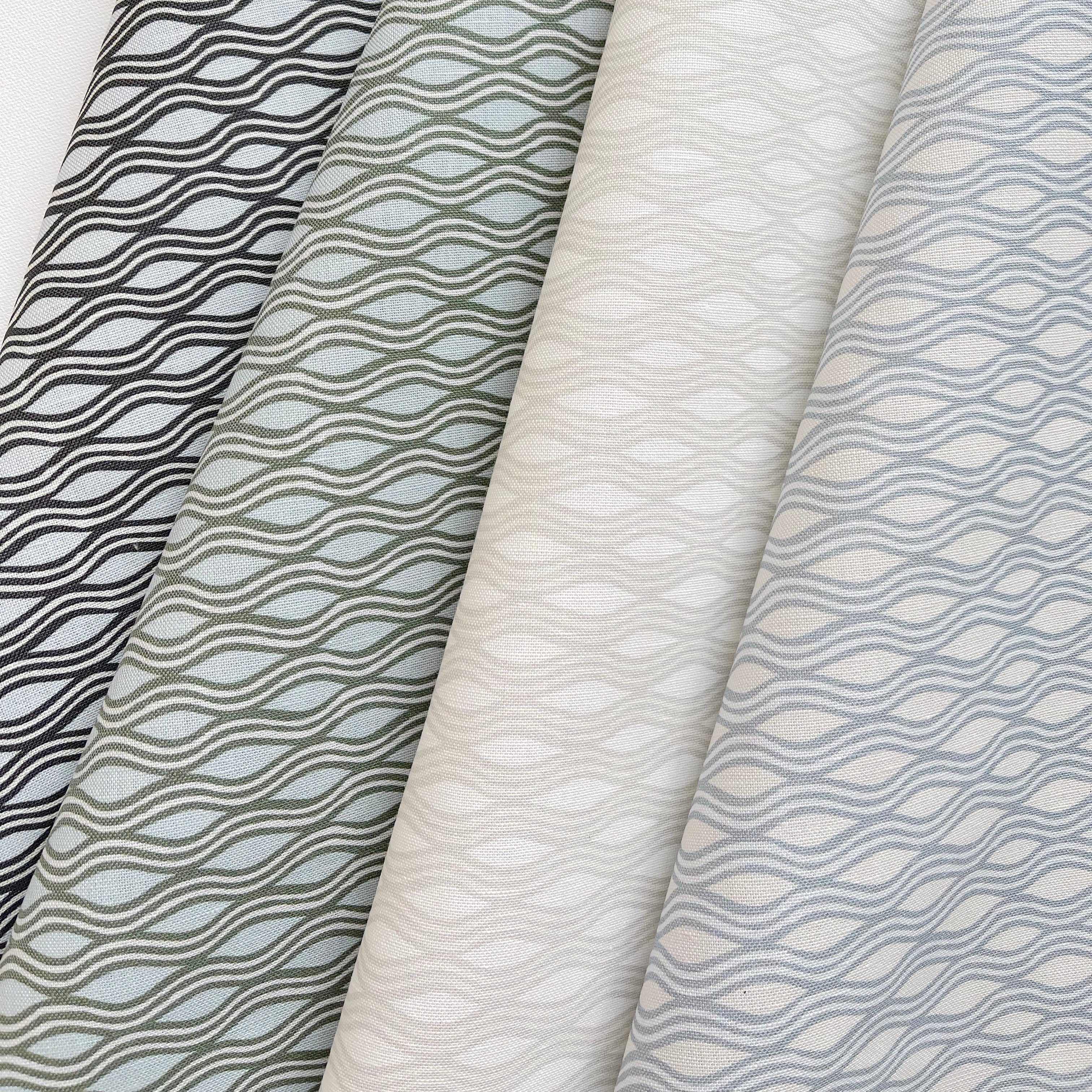 Inlet fabric in Juniper by Emily Daws styled in an interior — Waterways Collection