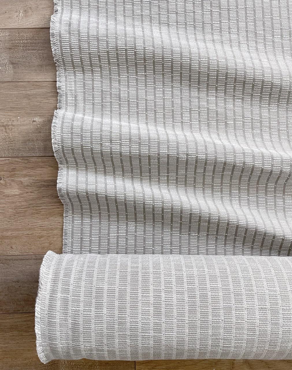 Jetty fabric in Dolphin by Emily Daws – styled in a Charleston coastal home; perfect for pillows, window treatments, or accent upholstery – Waterways fabric collection; Charleston luxury fabric by the yard for interiors and coastal homes
