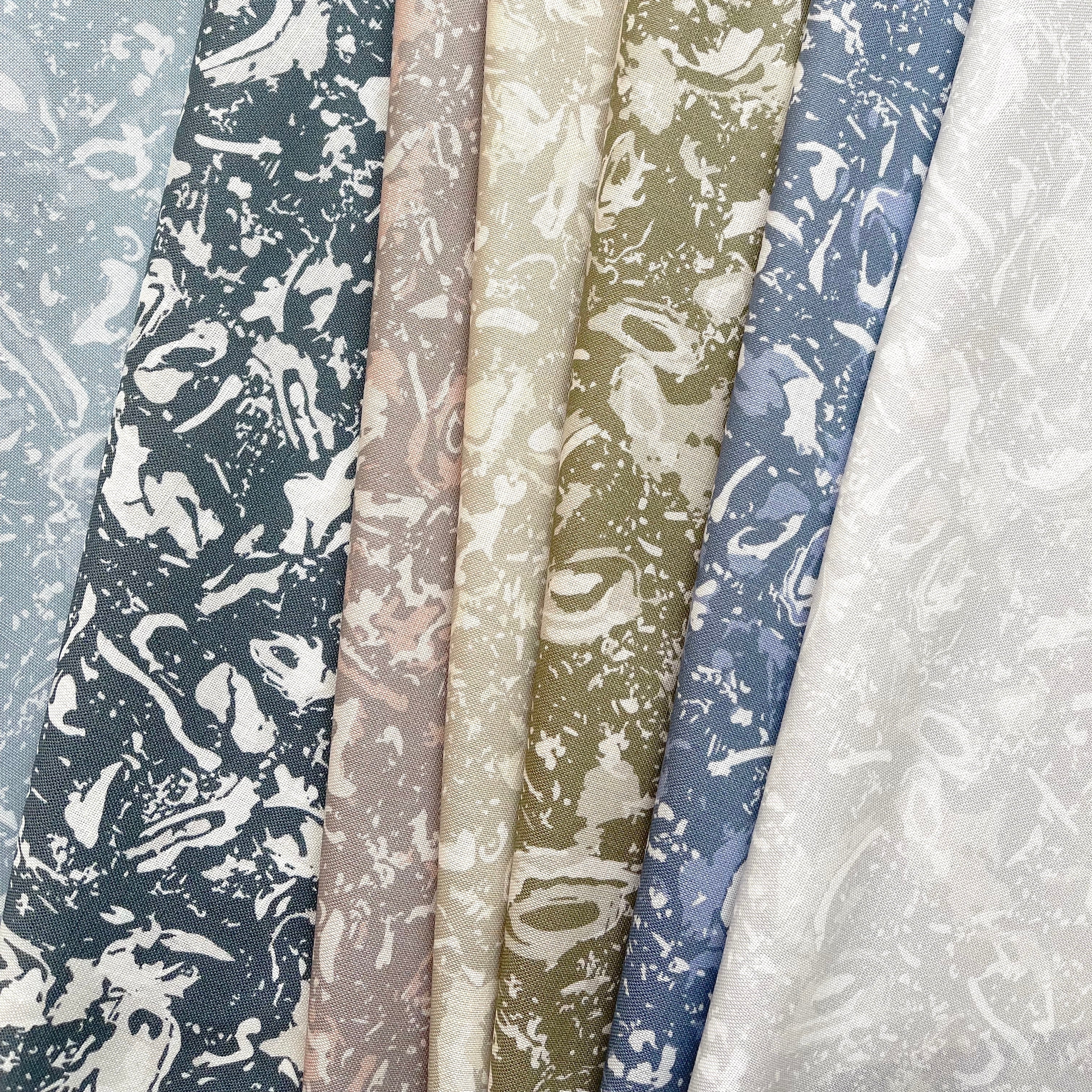River Reef fabric in Sunset by Emily Daws styled in an interior — Waterways Collection