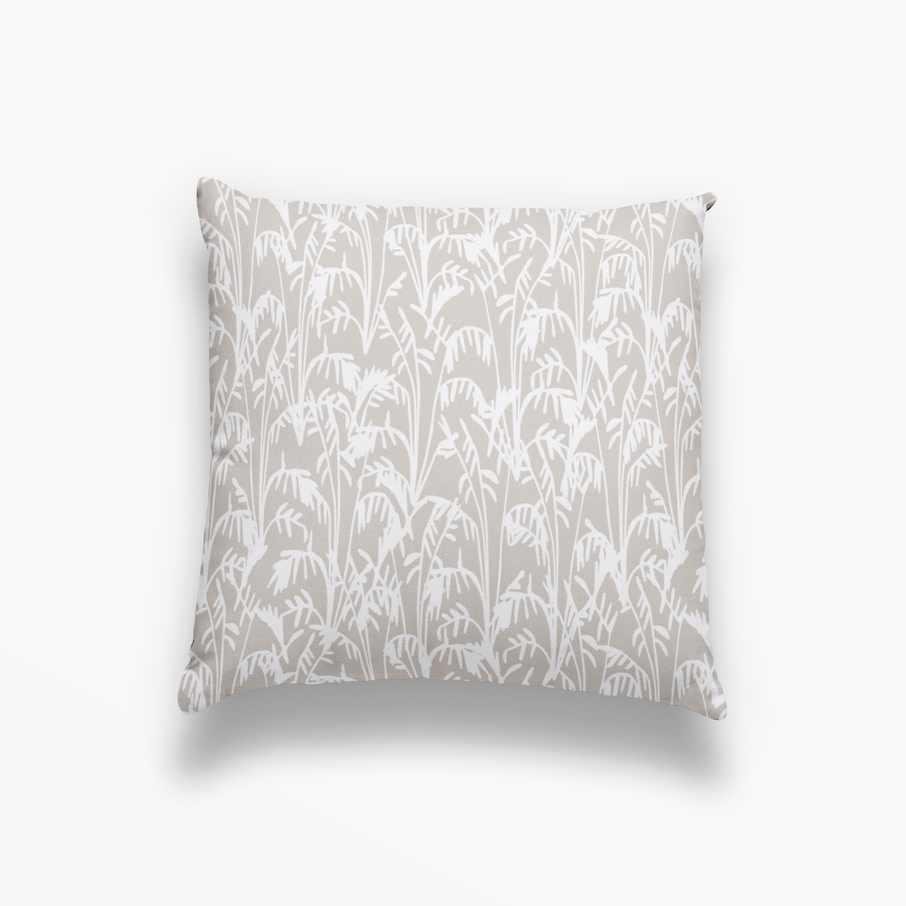 Emily Daws pillow with Southern-inspired textile design, styled for boutique interiors.