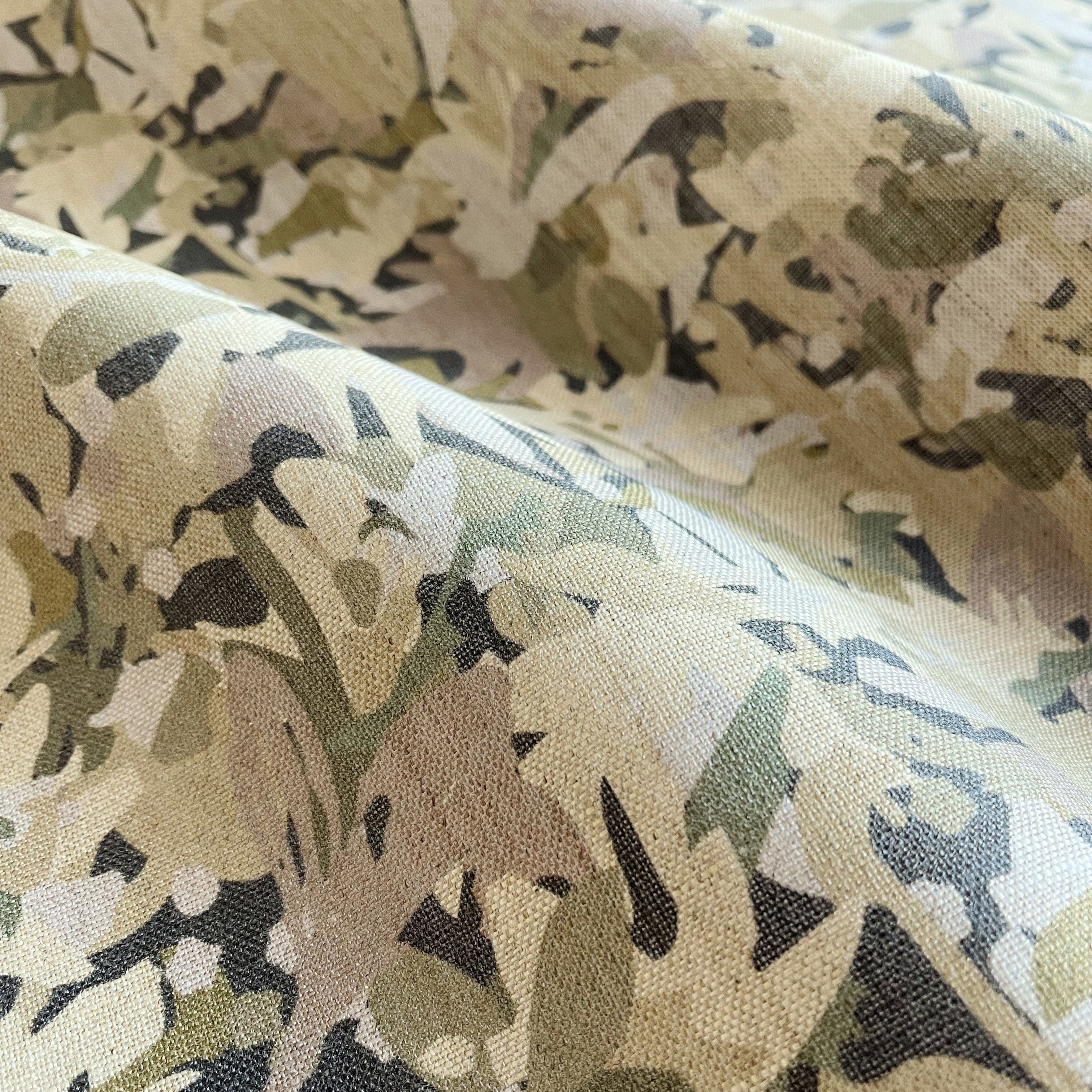 Thicket fabric in Sundrop – close-up of linen texture and leafy pattern; perfect for pattern sofas