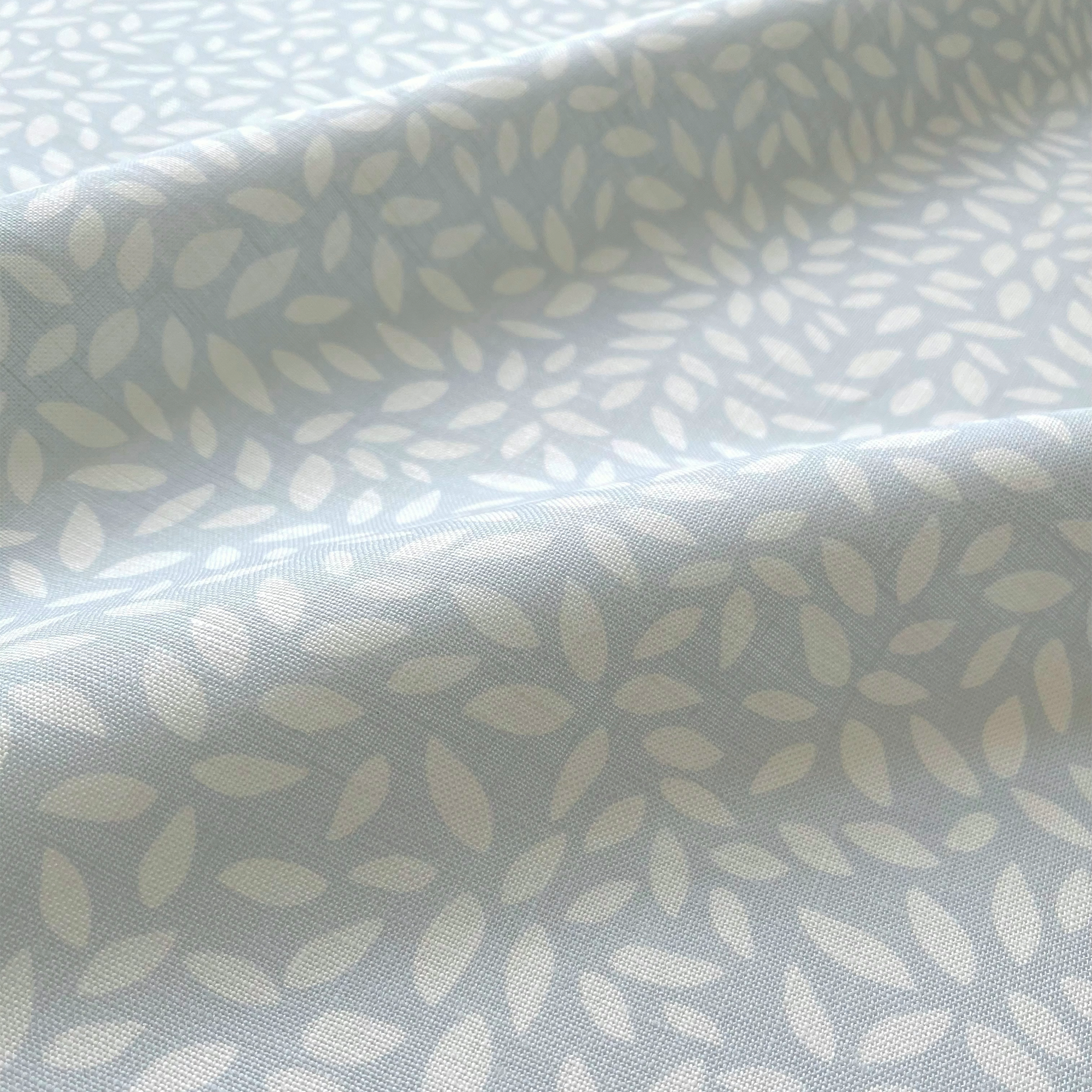 Wadmalaw fabric in Sky by Emily Daws – close-up showing natural fiber texture, ideal for beach house drapery or pillows – Sea Island fabric collection; luxury coastal fabric by the yard for interiors