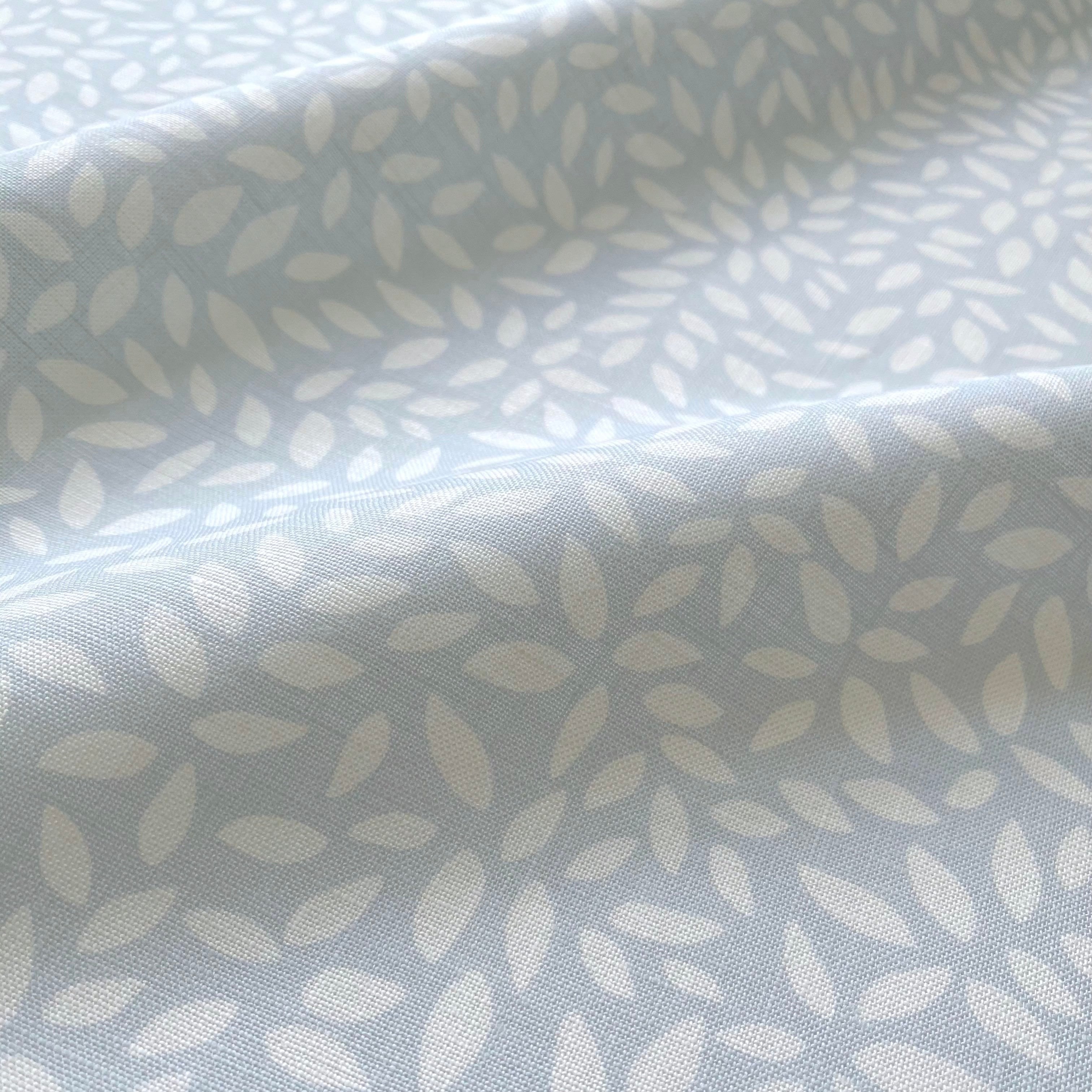 Wadmalaw Sky pillow by Emily Daws styled in an interior — Sea Island Collection