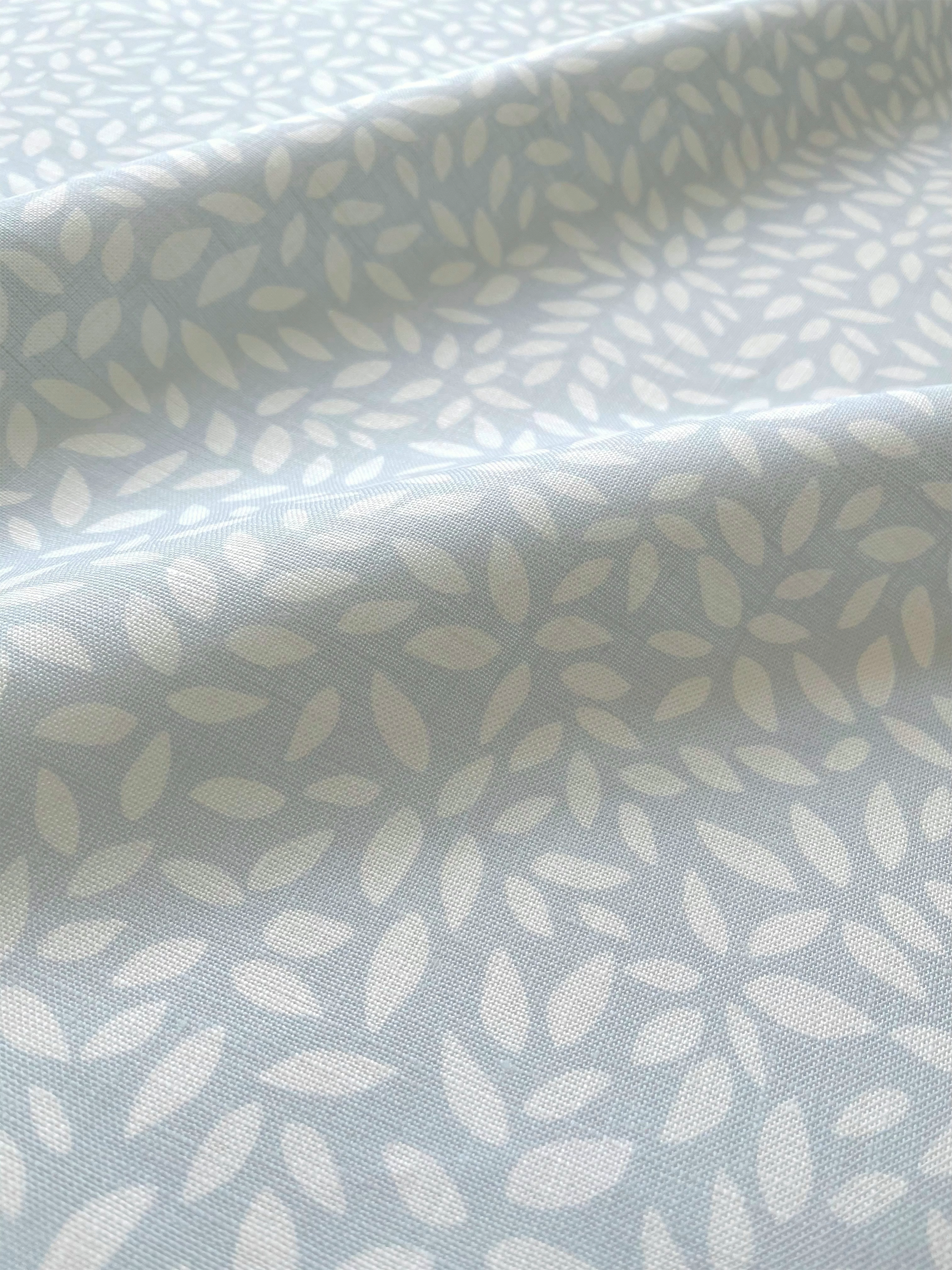 Wadmalaw fabric in Sky by Emily Daws – close-up showing natural fiber texture, ideal for beach house drapery or pillows – Sea Island fabric collection; luxury coastal fabric by the yard for interiors