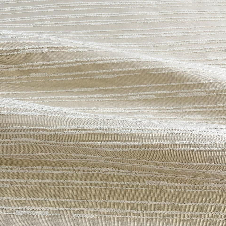 Washout fabric in Hominy by Emily Daws — close-up detail of woven upholstery fabric, Waterways Collection