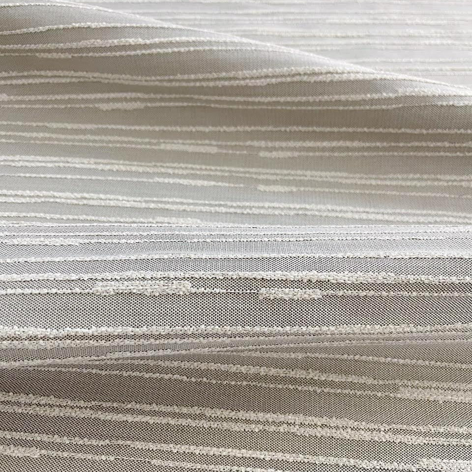 Washout fabric in Pebble by Emily Daws — close-up detail of woven upholstery fabric, Waterways Collection