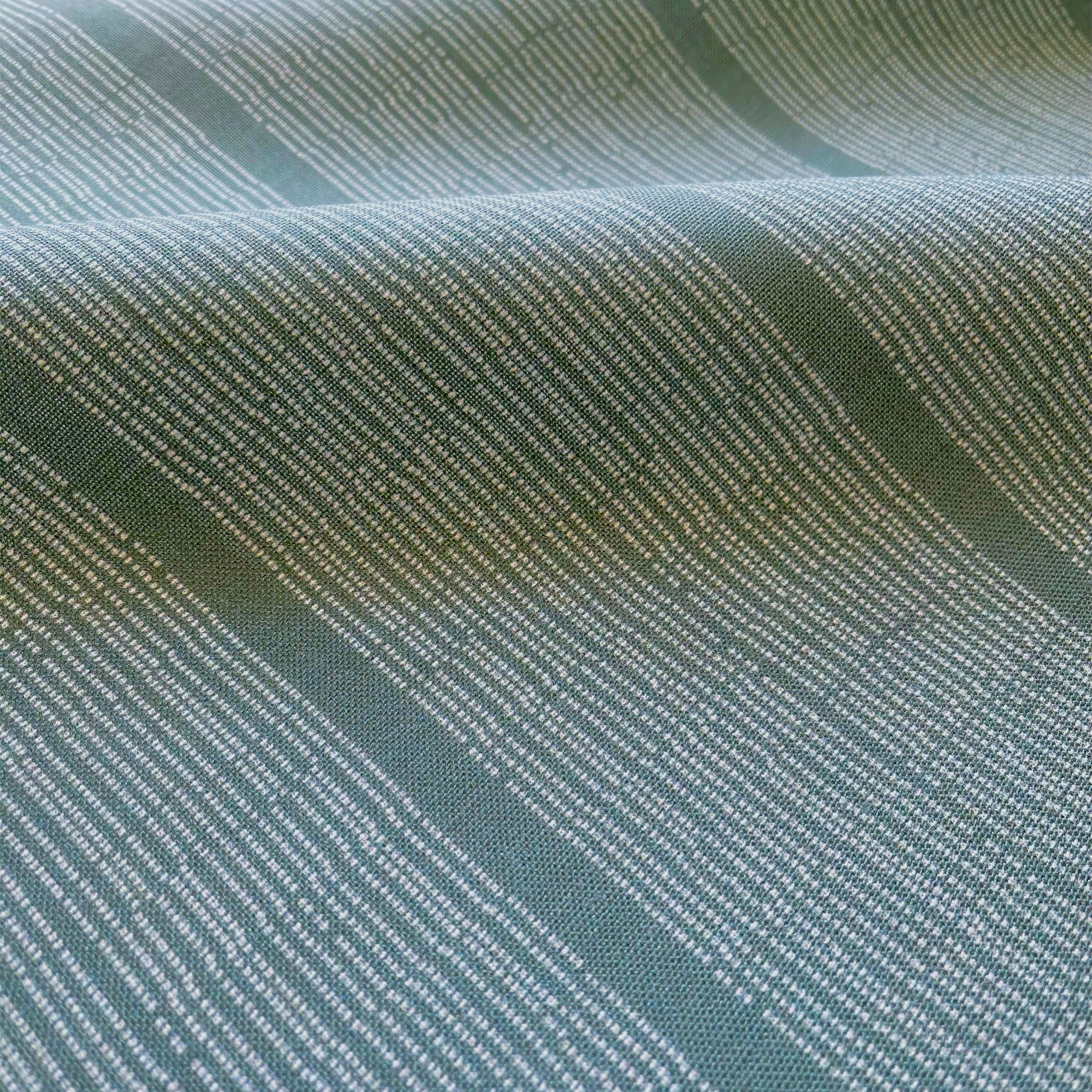 Close up view of coastal stripe fabric by Charleston designer, Emily Daws.